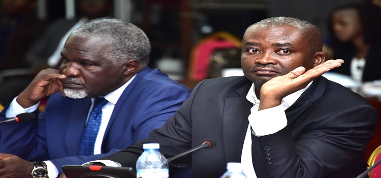 Kwizera (L) and Hon. Silas Aogon during the committee sitting